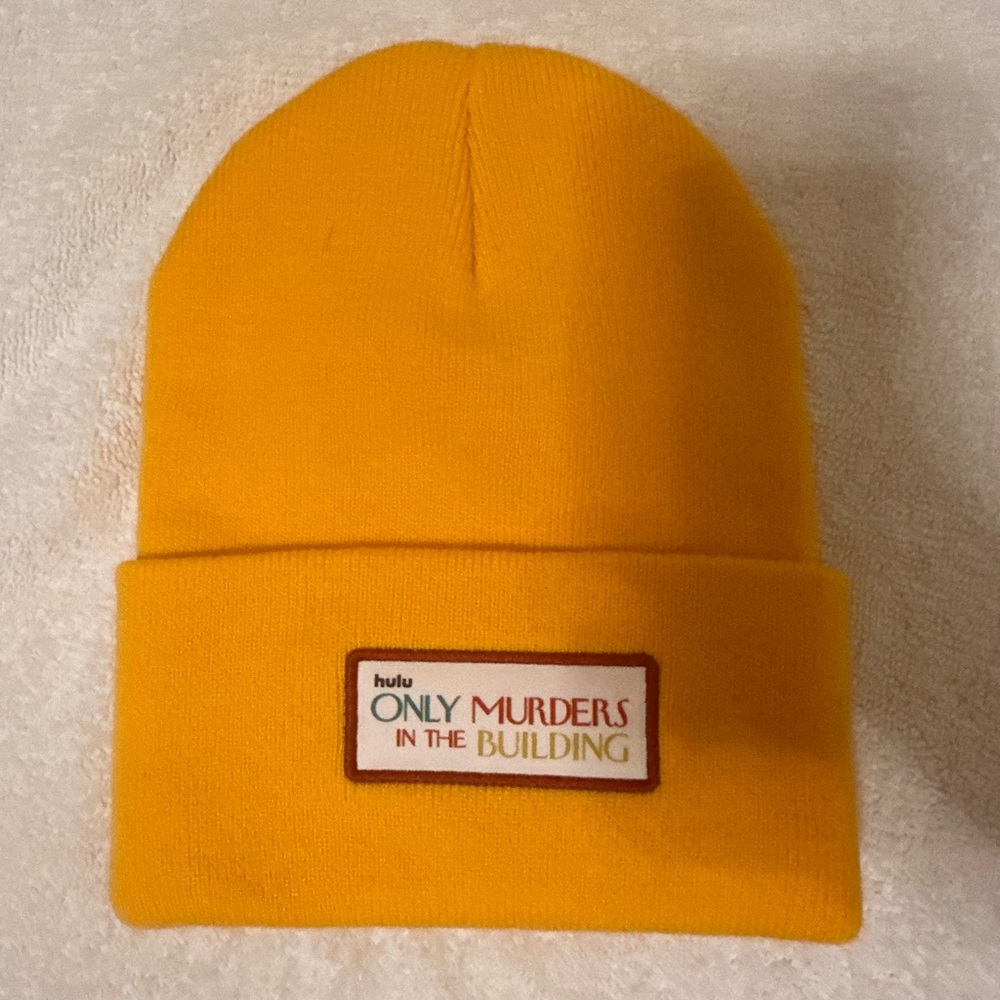 ONLY MURDERS IN THE BUILDING YELLOW BEANIE